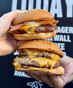 Bleecker Burger's new Soho location serving delicious burgers, perfect for on-the-go dining in London.