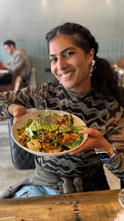 Delicious lunch at SOYO in Golders Green featuring smoothies, tomato soup, mixed salad, and desserts.