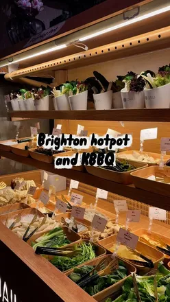Hotpot and Korean BBQ buffet at OFC Daiu in Brighton, featuring sushi, marinated meats, and delicious dipping sauces.