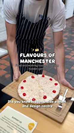 Food and walking tour in Manchester featuring unique stops, including a 2D restaurant, hidden cafรฉ, and local desserts.
