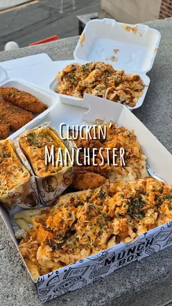 Alt text: "Delicious Nashville-inspired dishes from Cluckin' in Stockport, featuring gooey mozzarella sticks, toasties, and loaded fries.