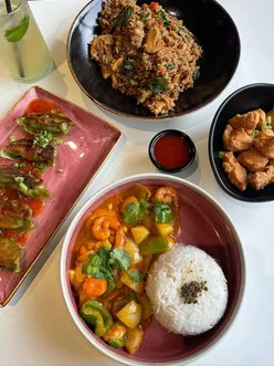 Delicious Thai dishes at Thai Express Kitchen in Cabot Circus, Bristol, featuring dumplings, curry, and fried rice.