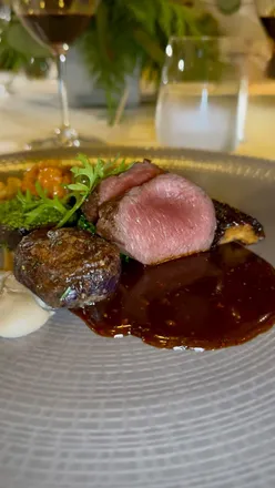 Guests enjoying a festive meal at The Art School restaurant, featuring gourmet dishes for Christmas celebrations in Liverpool.