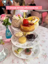 Vegan afternoon tea at Cream Dream in Covent Garden featuring scones, pastries, wraps, and Ukrainian bruschetta.