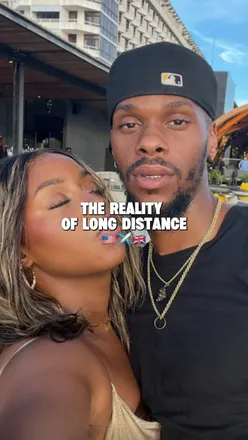 Couple celebrating a joyful airport reunion, enjoying an American wedding-themed moment together.