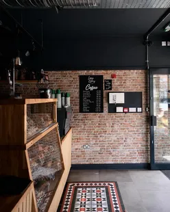 Food critic exploring Birmingham's best bakeries and eateries for new book edition, sampling diverse culinary highlights.