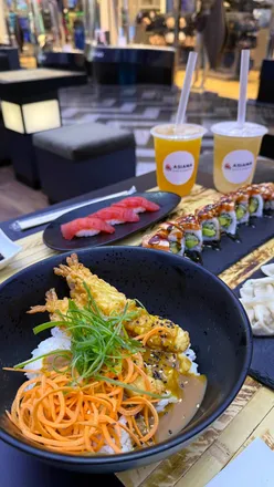 Delicious sushi and poke bowls at Asiana Sushi & Poke in Victoria Gate, featuring teriyaki rolls and refreshing bubble tea.