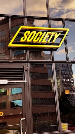 Dining at Society in Birmingham, enjoying diverse food from independent traders in a vibrant atmosphere.