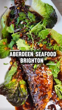 Delicious seafood dishes at Aberdeen Seafood in Brighton, including spicy Thai scallops and wok-fried seabass.