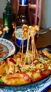 Delicious Italian dishes at Prezzo on George Street: mozzarella sticks, burrata, rigatoni, margherita pizza, and tiramisu.