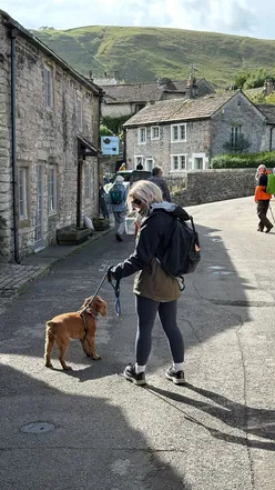 Open-top bus ride on the Peak Sightseer in the Peak District, offering stunning views and dog-friendly travel.