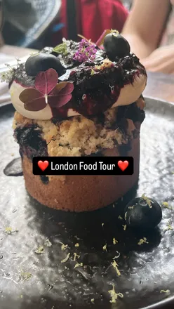 Food lovers enjoying treats from top London eateries during a memorable trip in Notting Hill.
