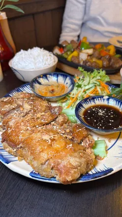 Fresh prawn and pork summer rolls and crispy roast duck at Vietnam House in Edinburgh for a vibrant dining experience.
