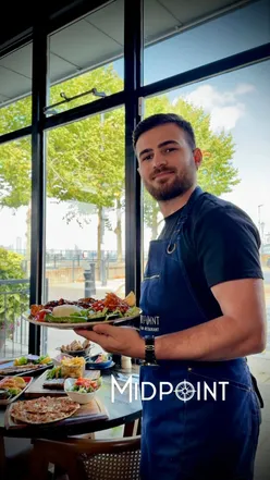 Stunning riverside dining at Midpoint Turkish Restaurant in Greenwich, with views of Canary Wharf and the O2.