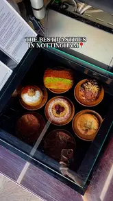 Pastries from Effy Stores in Nottingham, featuring a variety of delicious bakes like croissants and custard pies.