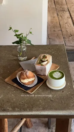 Cozy autumn morning at Uchi Bake in Clapton, enjoying matcha desserts and sandwiches in a warm, inviting space.