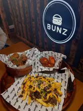 Delicious September monthly specials at Bunz in Bletchley: birria fries, croquetas, and honey garlic chicken tenders!