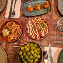 Enjoying delicious meals and @rattlercyder in Falmouth, featuring dishes from local restaurants like @casatapa and @verdant_seafood_bar.