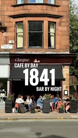 Alt text: "1841 Coffee café and bar in Hyndland, bustling with patrons enjoying refreshments and cozy ambiance.
