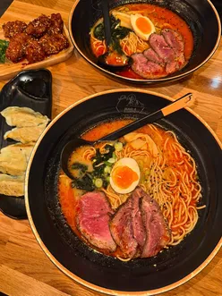 Delicious steak ramen, teriyaki chicken, and gyoza at Maki & Ramen in Leeds, showcasing flavorful Japanese cuisine.