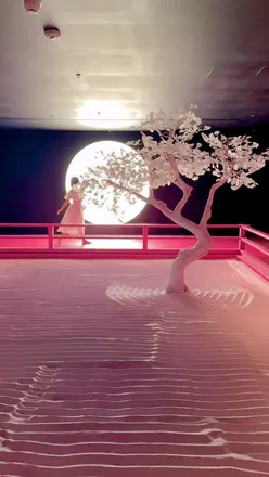 Visitors exploring immersive art installations at the Moco Museum in London, featuring works by famous contemporary artists.