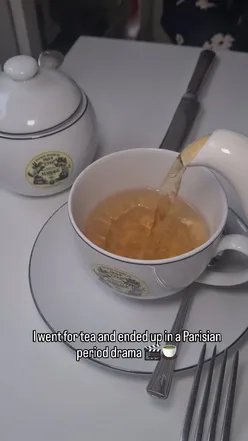 Enjoying a Parisian chic afternoon tea at Mariage Frères in Covent Garden, featuring tea-infused treats and historic ambiance.