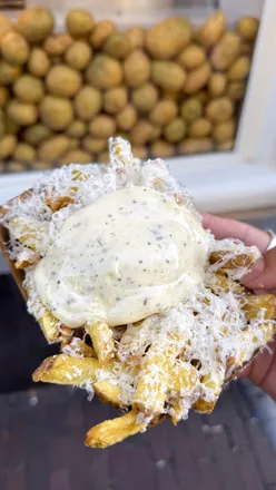 Delicious Utrecht frites, stroopwafels, and ribeye steak enjoyed during a 48-hour trip to Amsterdam.