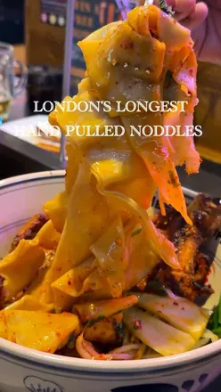 Delicious starters and signature hand-pulled belt noodles at Belt Noodles, Chinatown, London. Perfect for noodle lovers!