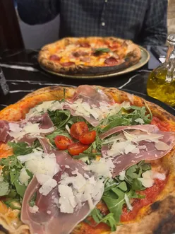 Delicious bruschetta and garlic focaccia at Scaramantica Pizzeria in Roath, perfect for pizza lovers and good vibes.