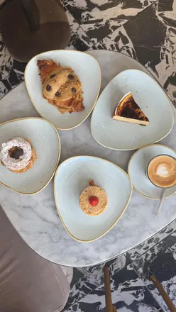 Delectable French pastries including Paris Brest, vanilla flan, crookie, and fraisier at Philippe Conticini in South Kensington.
