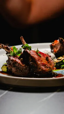 Event food photography at Leeds United's hospitality suites, capturing vibrant dishes and attendees enjoying the atmosphere.