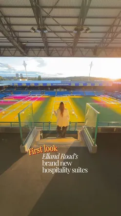 Inside Leeds United's new hospitality suites at Elland Road, featuring unique event spaces and gourmet dining options.