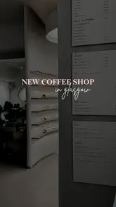 Minimalist coffee shop interior at Kloud Concept in Glasgow, offering pastries by day and cocktails by night.