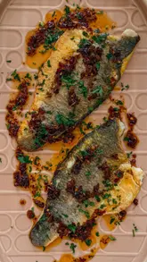 Delicious chilli and lemongrass sea bass dish featured in FANTASTIC FISH S3E2, inspired by Vietnamese cuisine.