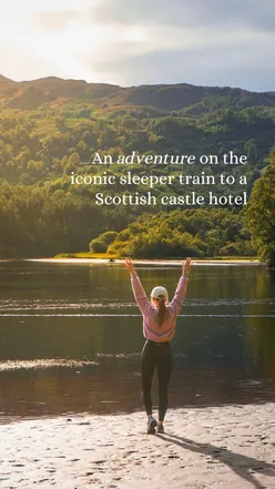 Traveler enjoying the Caledonian Sleeper train journey to a fairytale castle hotel in Scotland, with scenic views.