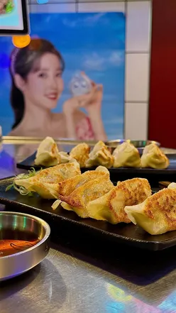 Dumpling crawl in Chinatown London, featuring xiao long bao, mandu, and Sichuan dumplings celebrating National Dumpling Day.