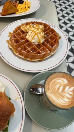 Celebrating 32 at Mollie's Motels Oxford, enjoying luxe design and delicious breakfast treats like waffles and breakfast bun.