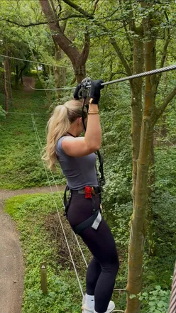 Adventurers tackling treetop challenges and ziplines at Go Ape in Newcastle, enjoying a fun-filled day in nature.