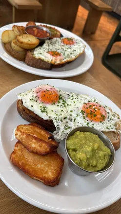 Customers enjoying brunch at Marmaduke's Cafe in Sheffield, surrounded by fresh bakes and cozy vibes.