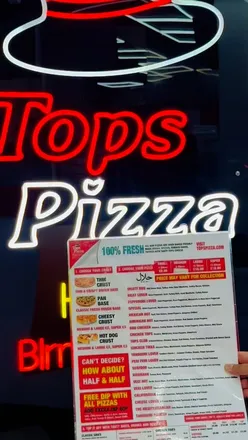 Delicious halal chicken tikka and BBQ pizzas with sides at Tops Pizza in Acocks Green, Birmingham—perfect for foodies!