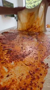 Delicious sourdough bread with rose harissa and roasted garlic for a flavorful home baking experience.