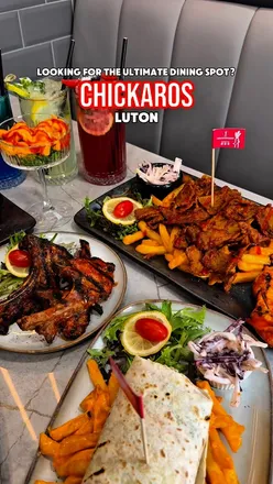 Enjoying a variety of dishes including lamb chops, prawn tacos, and mocktails at CHICKAROS® in the UK.