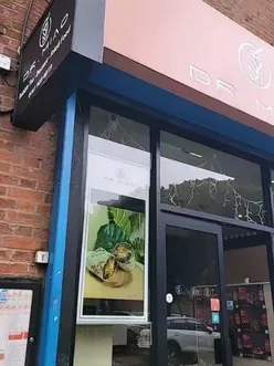 Delicious Taiwanese popcorn chicken and fried chicken rice roll at Dr. Miao in Manchester, highlighting authentic flavors.