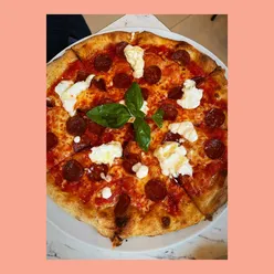 Delicious pepperoni pizza with burrata and vodka sauce at Grosso in Duke Street, Glasgow – a must-visit for foodies!