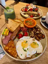 Brunch at Westbird Café with iced matcha, Biscoff latte, Full English breakfast, and chocolate waffles in Westbourne.