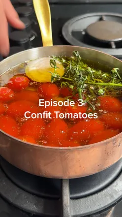 Delicious confit tomatoes with garlic and cheese, perfect for salads, pasta, toast, or straight from the jar.