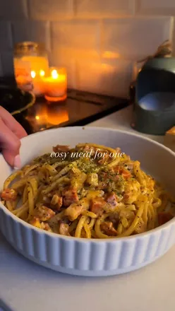 Delicious creamy bacon and chorizo spaghetti, perfect for cozy nights in with candles and fairy lights.