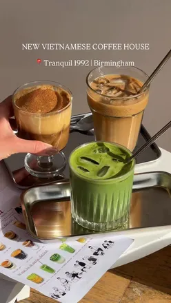 Visitors enjoying Vietnamese coffee and matcha lattes at Tranquil 1992 Coffee House, Jewellery Quarter, Birmingham.