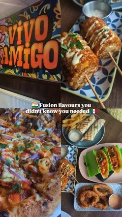 Alt text: "Indo-Mexican fusion dishes at Vivo Amigo, featuring taquitos, masala fries, calamari, and unique half-and-half pizza.