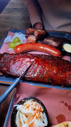 Delicious BBQ feast featuring St Louis ribs and pork rashers at Spitfire BBQ, St Maryโs Street, Cardiff.